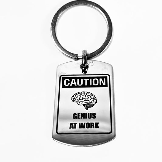"Caution: Genius at Work" Keychain